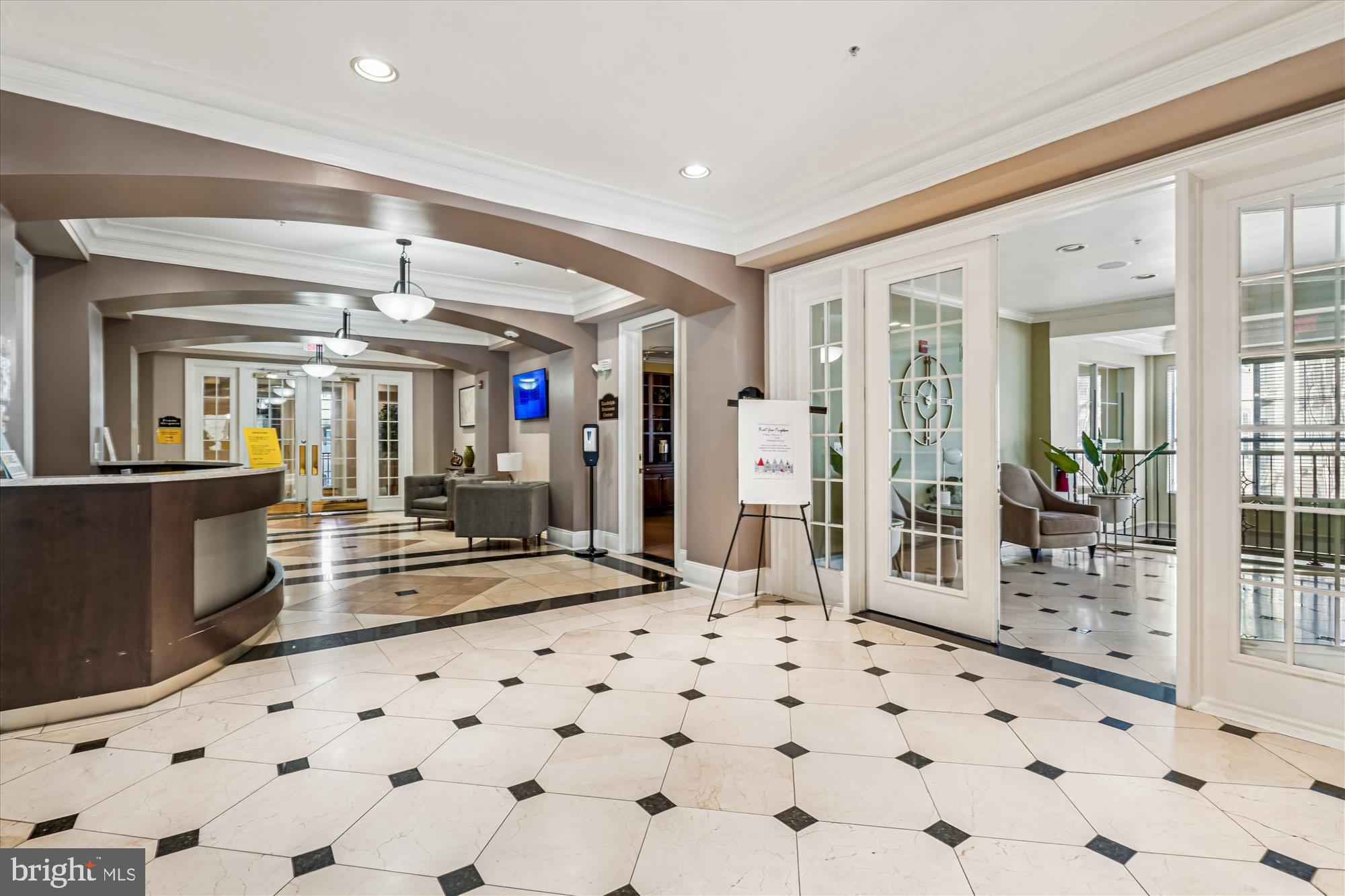 11750 Old Georgetown Road, Unit 2313 Rockville, MD 20852 - Photo 9 of 59 a living room with a large mirror