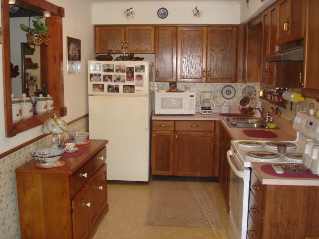 9-10 Hemlock Road Kunkletown, PA 18058 - Photo 7 of 12 a kitchen with stainless steel appliances granite countertop a sink stove and refrigerator