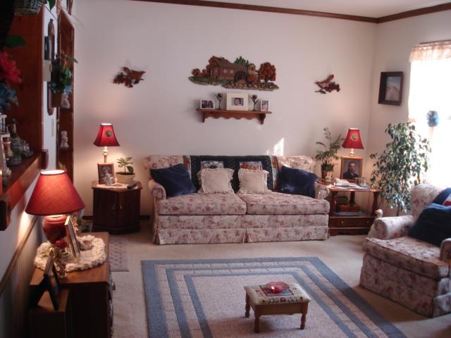 9-10 Hemlock Road Kunkletown, PA 18058 - Photo 8 of 12 a living room with furniture and a lamp