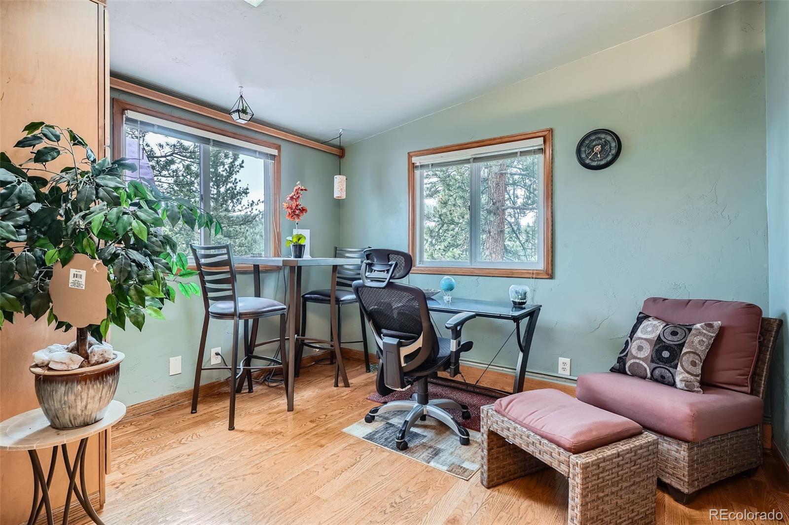 21191 Pleasant Park Road Conifer, CO 80433 - Photo 21 of 44 a view of a livingroom with furniture and a window