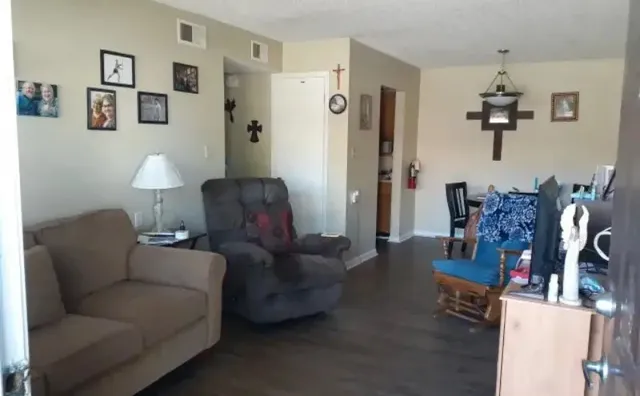 a living room with furniture and a couch