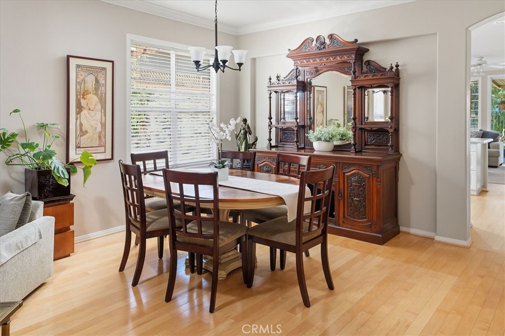 25808 Barnett Lane Stevenson Ranch, CA 91381 - Photo 13 of 38 a view of a dining room with furniture window and wooden floor