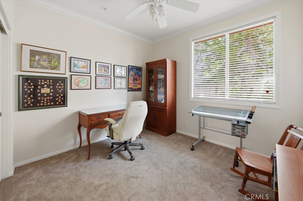 25808 Barnett Lane Stevenson Ranch, CA 91381 - Photo 19 of 38 a view of a workspace with furniture and a window