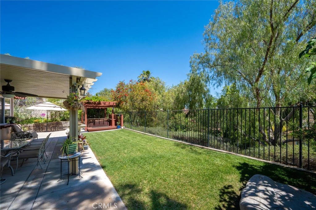 25808 Barnett Lane Stevenson Ranch, CA 91381 - Photo 23 of 38 a view of a backyard with sitting area