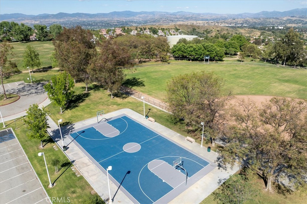 25808 Barnett Lane Stevenson Ranch, CA 91381 - Photo 34 of 38 aerial view of a house with a yard