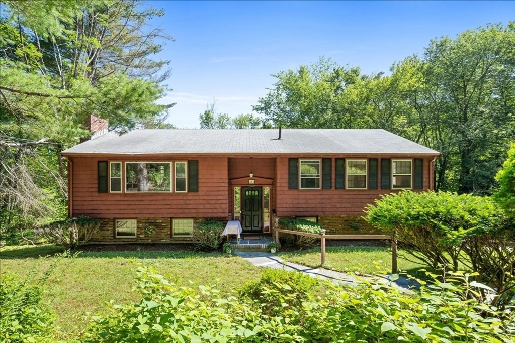352 Hill Road Boxborough, MA 01719 - Photo 1 of 25 a view of house with yard and sitting area