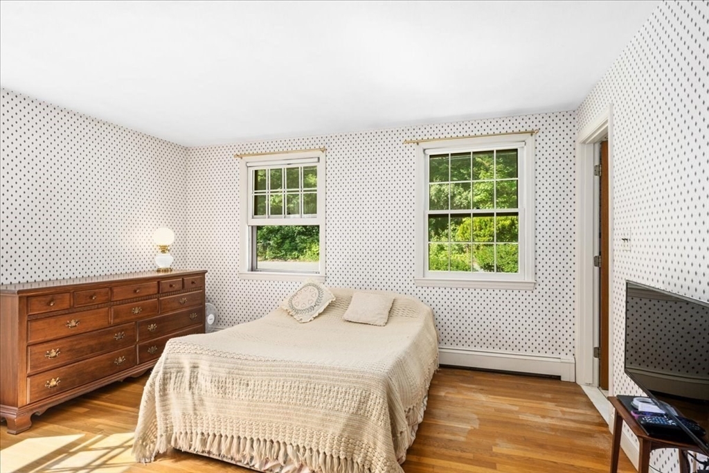 352 Hill Road Boxborough, MA 01719 - Photo 11 of 25 a bedroom with a bed and a window