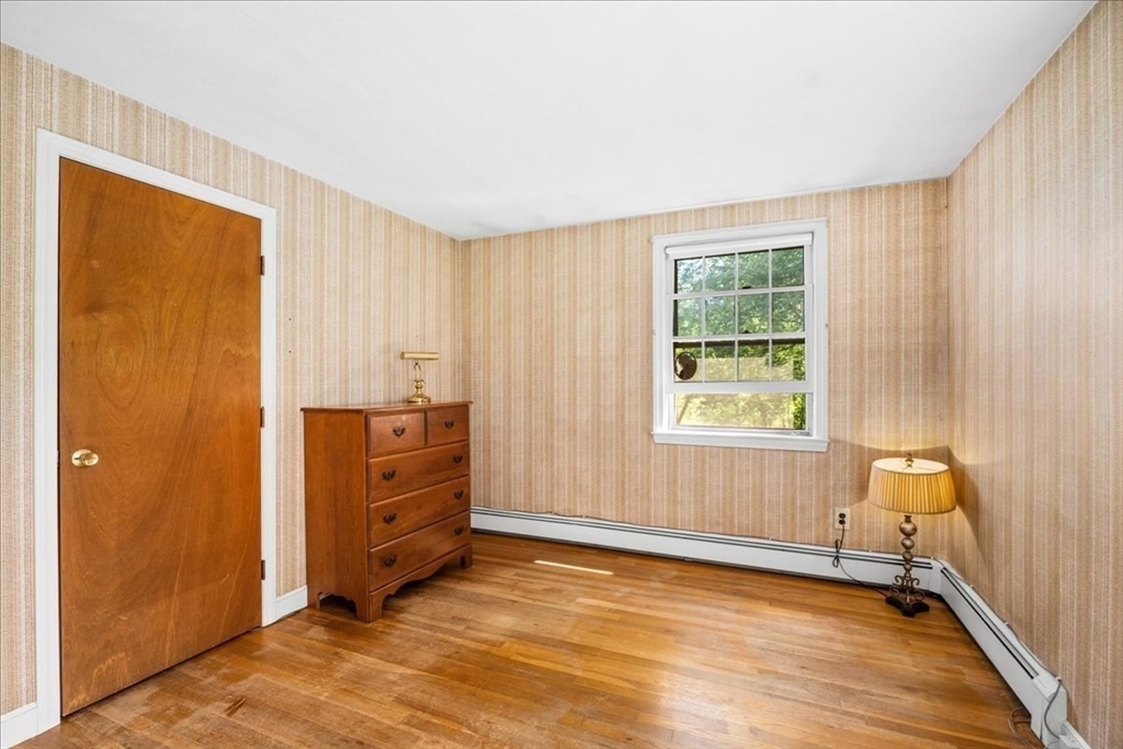 352 Hill Road Boxborough, MA 01719 - Photo 14 of 25 an empty room with windows and closet