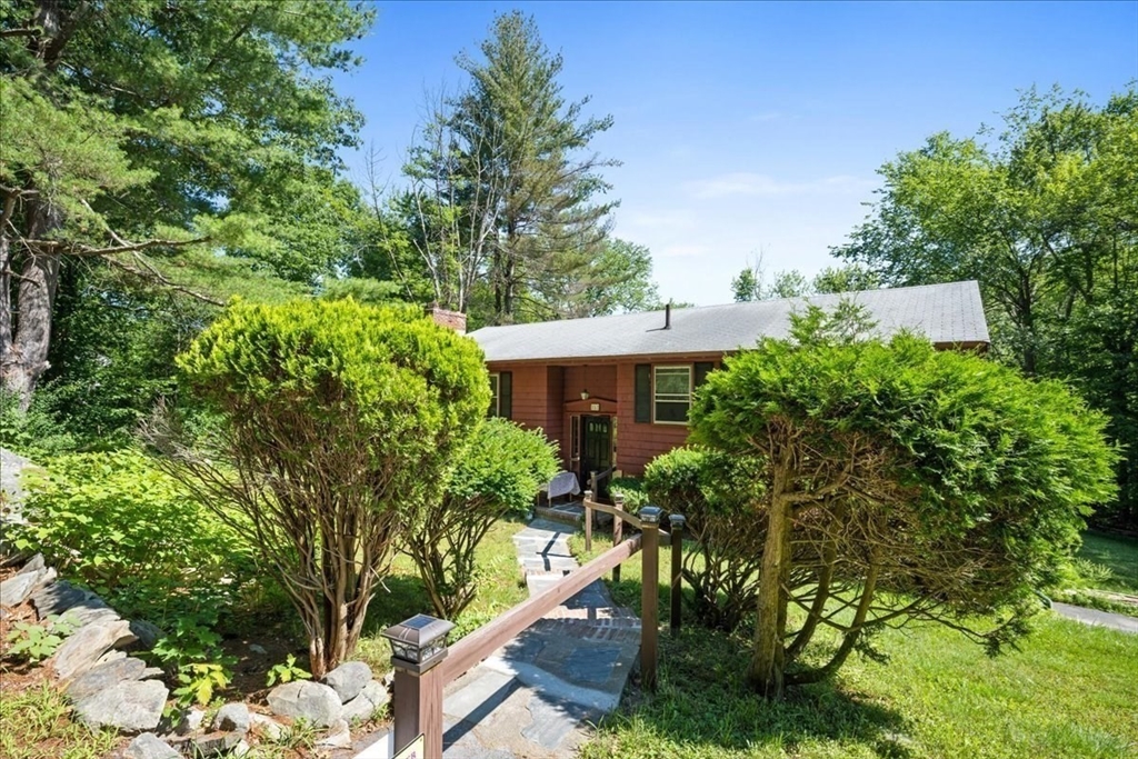 352 Hill Road Boxborough, MA 01719 - Photo 4 of 25 a view of house with yard and sitting area