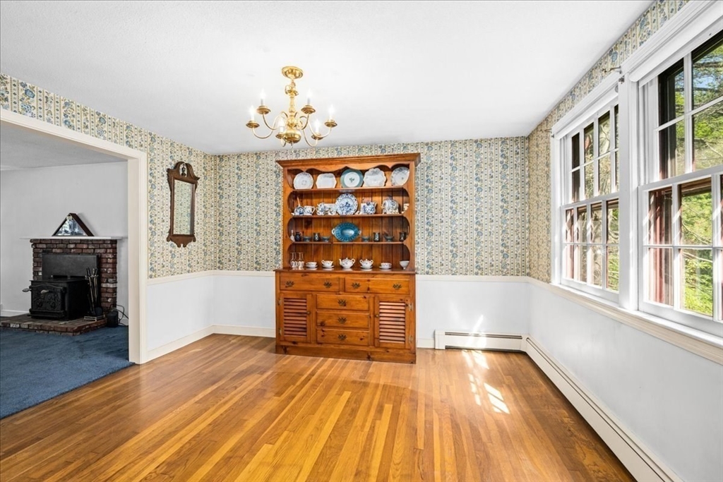 352 Hill Road Boxborough, MA 01719 - Photo 8 of 25 wooden floor in an empty room with a window