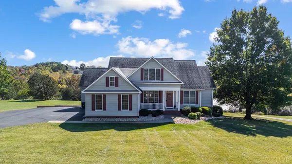 a view of a house with a big yard