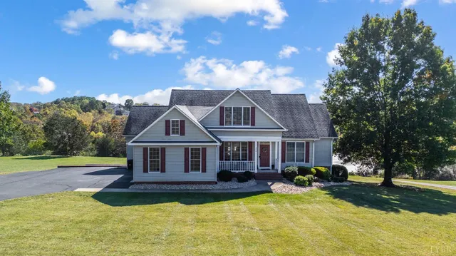 a view of a house with a big yard