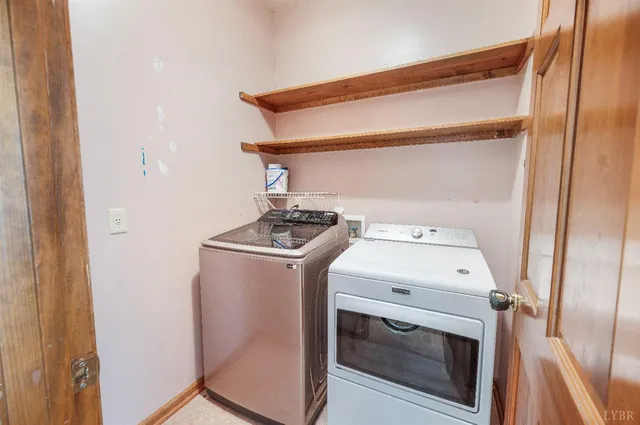 an empty room with closet and fan