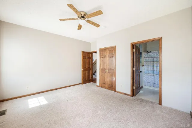 a view of workspace with a ceiling fan