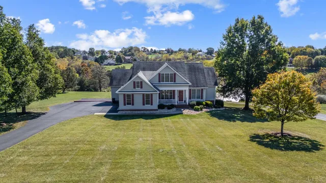 an aerial view of a house with a garden
