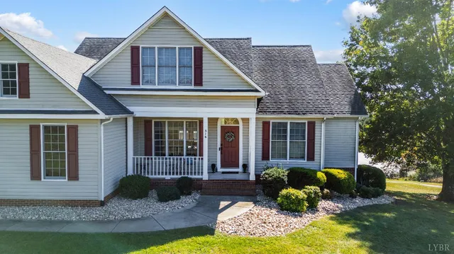 a view of a big yard with a house