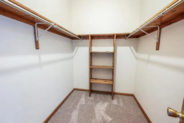 a kitchen with stainless steel appliances granite countertop a stove microwave and cabinets