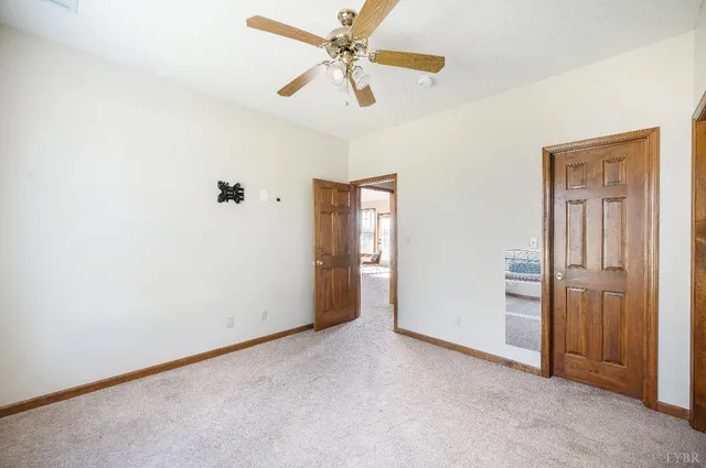 an aerial view of a houses with yard