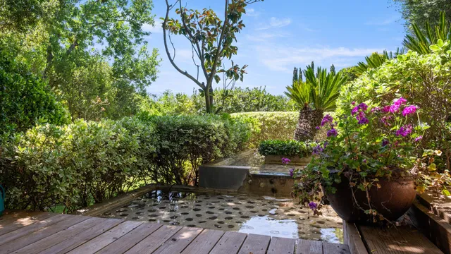 a view of a chairs and table on the wooden floor