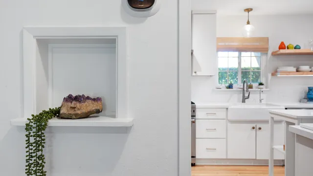 a kitchen with a sink and a window