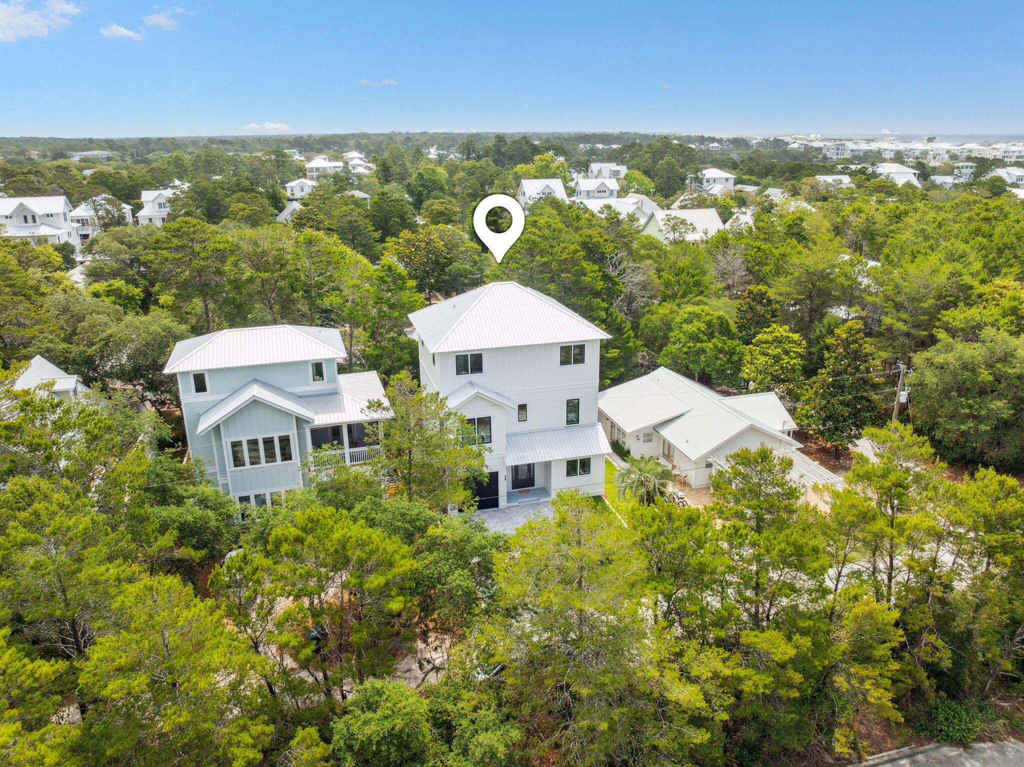 55 May Drive Santa Rosa Beach, FL 32459 - Photo 1 of 57 a aerial view of a house with a yard