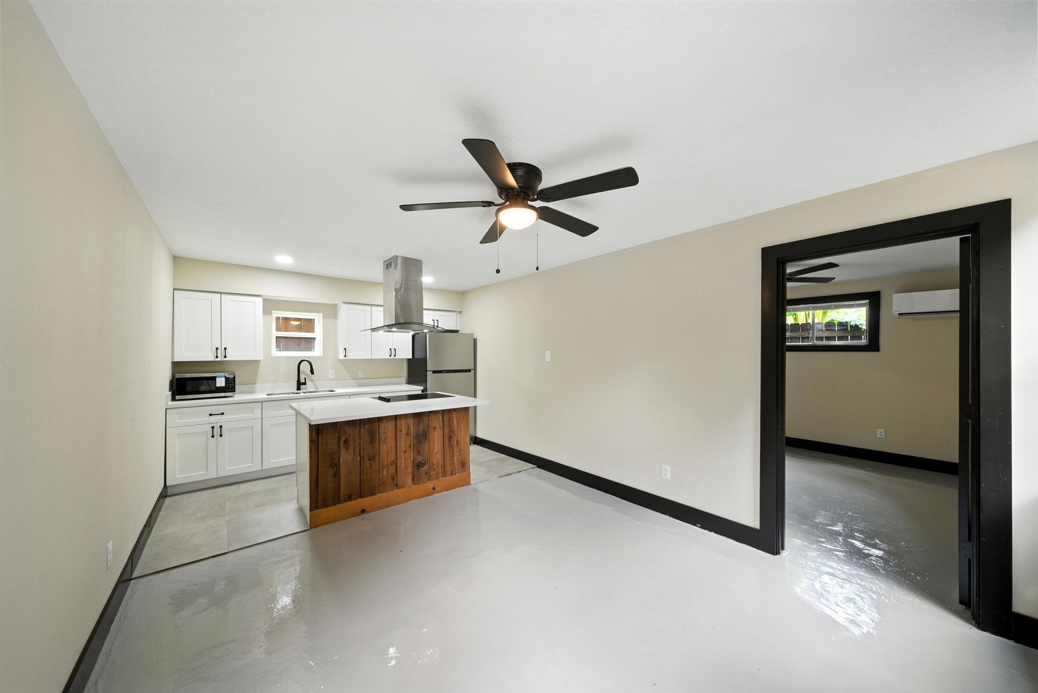 a kitchen with a cabinets and white appliances