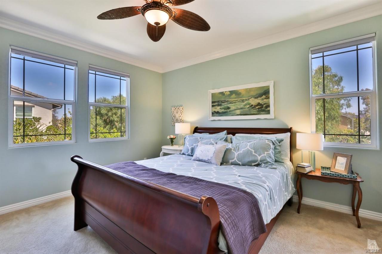 401 Spring Park Road Camarillo, CA 93012 - Photo 22 of 43 a bedroom with a bed and a painting on the wall