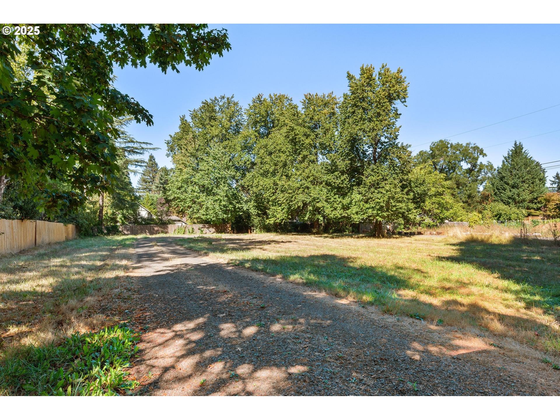 11990 Southwest Denney Road Beaverton, OR 97008 - Photo 27 of 30 a view of a yard with yellow house
