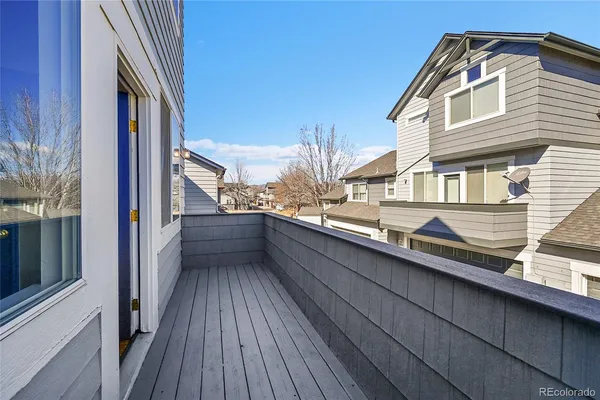 a view of a house with a roof deck