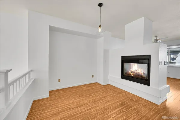 a bedroom with a bed and a fireplace