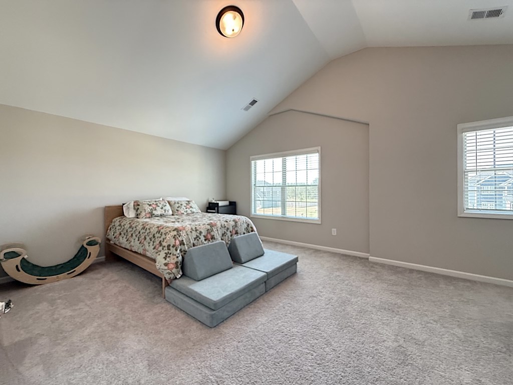 33 Sugar Maple Drive Fort Mitchell, AL 36856 - Photo 24 of 29 a bedroom with a bed and window