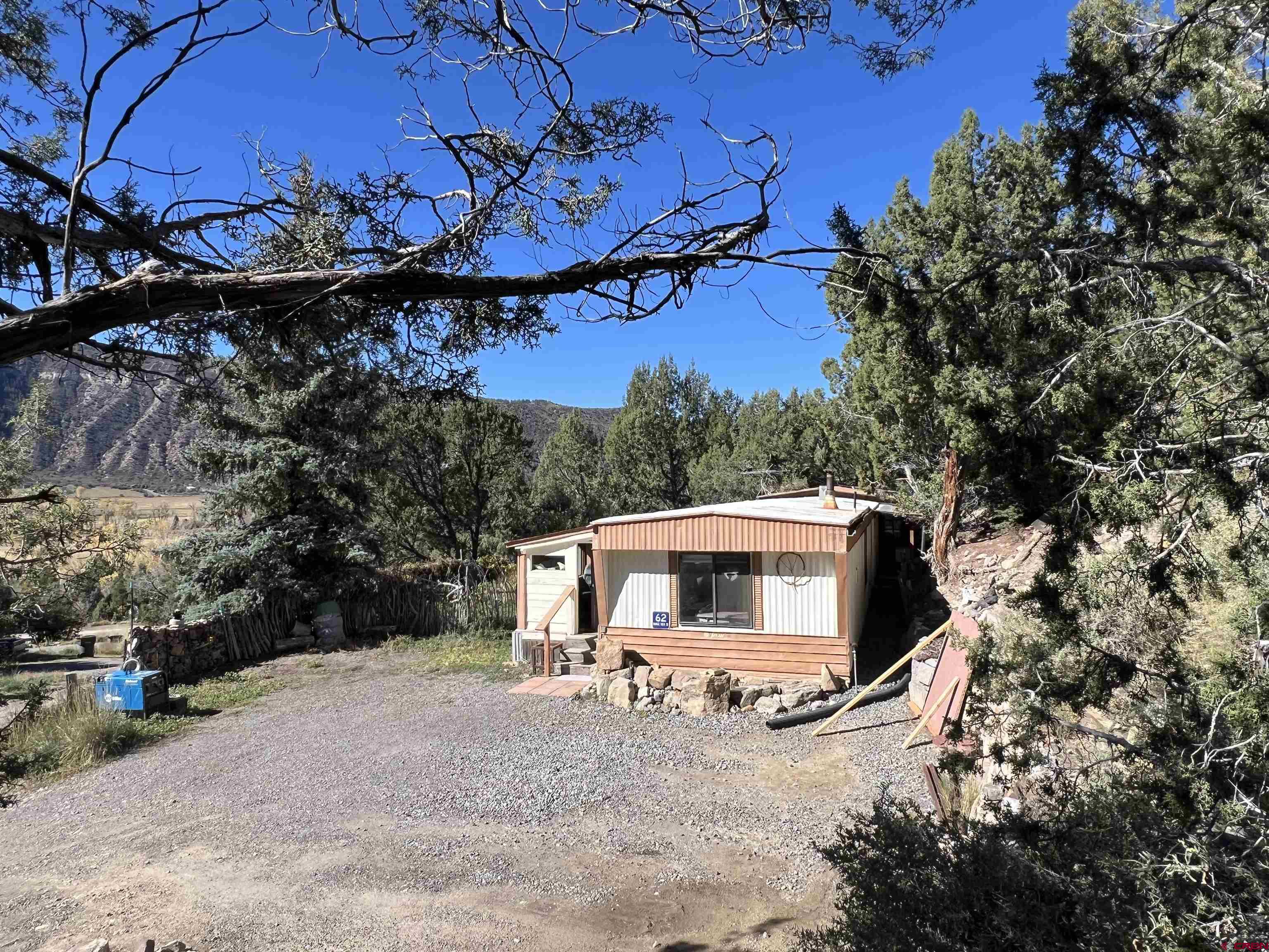 62 Range View Trail Ridgway, CO 81432 - Photo 2 of 21 a view of a house with a yard