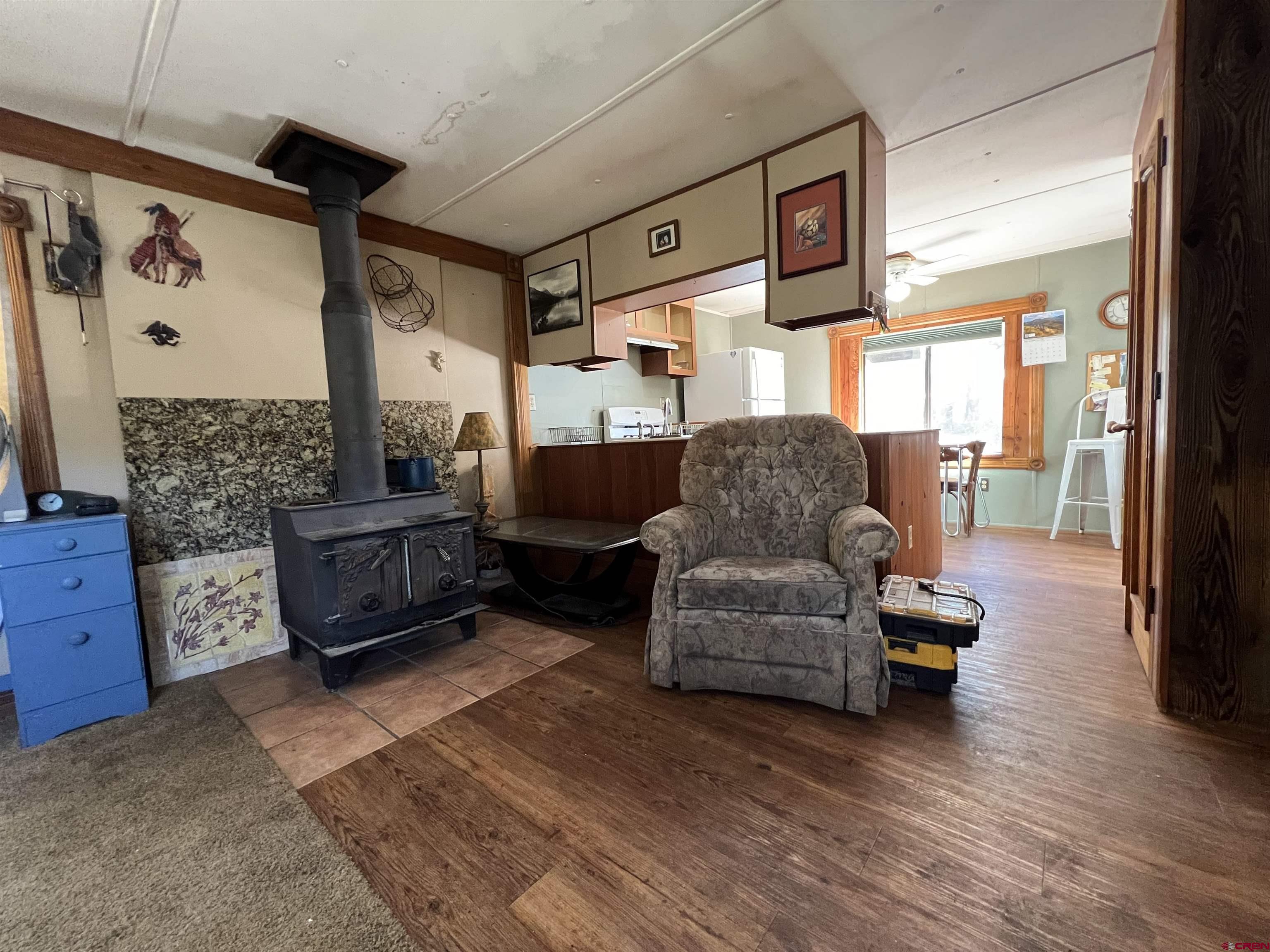 62 Range View Trail Ridgway, CO 81432 - Photo 9 of 21 a living room with furniture and a large window