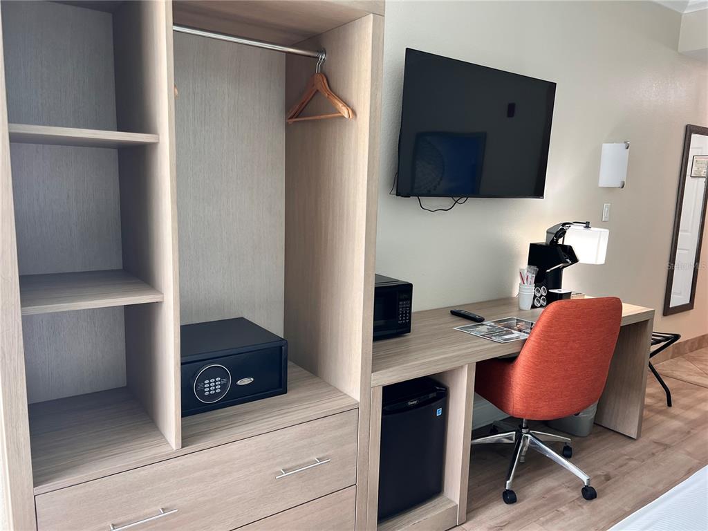 3000 Maingate Lane, Unit 506 Kissimmee, FL 34747 - Photo 12 of 18 a view of a workspace with furniture