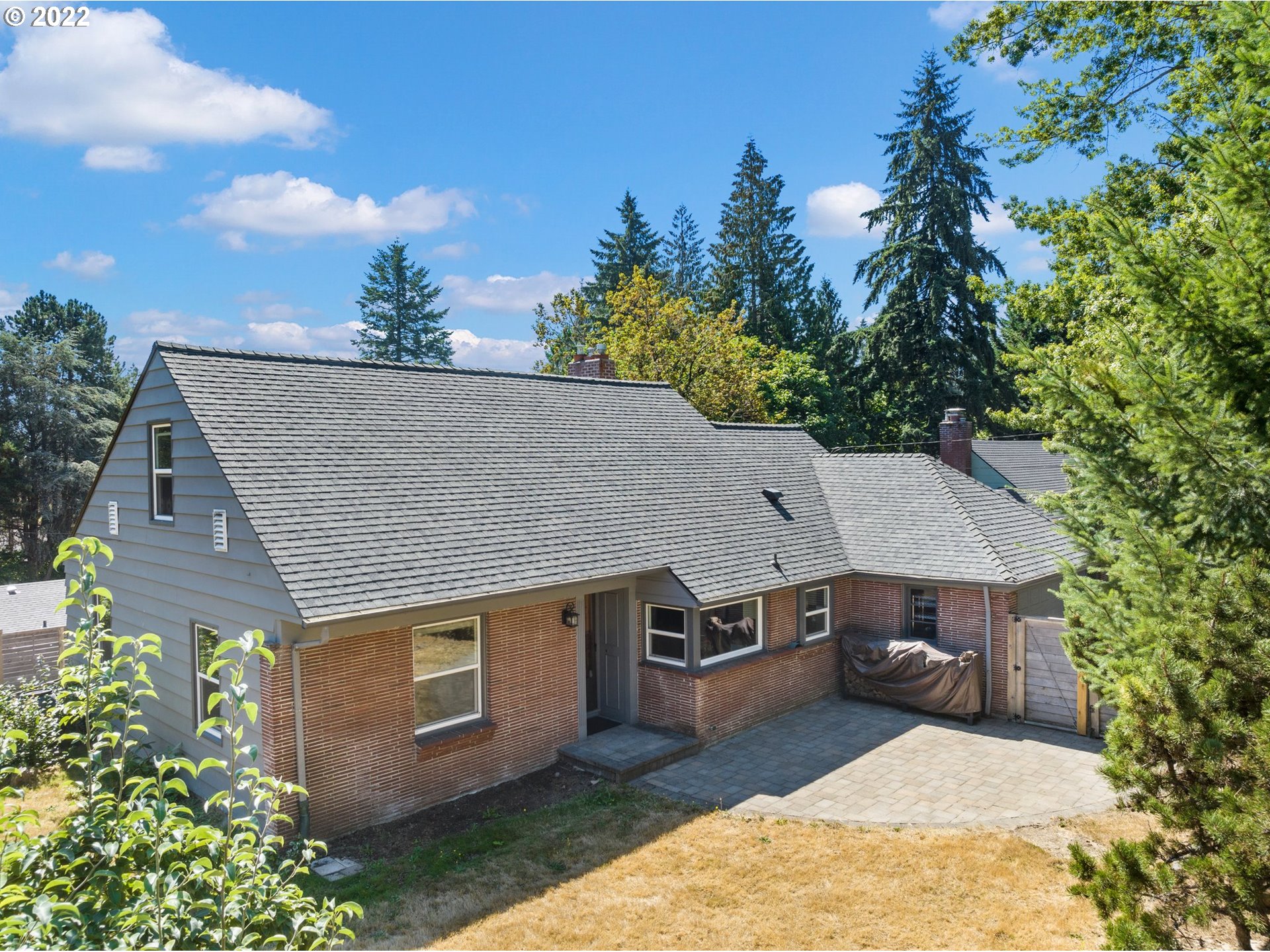 7320 Southwest Canyon Lane Portland, OR 97225 - Photo 1 of 32 an aerial view of a house with yard and entertaining space