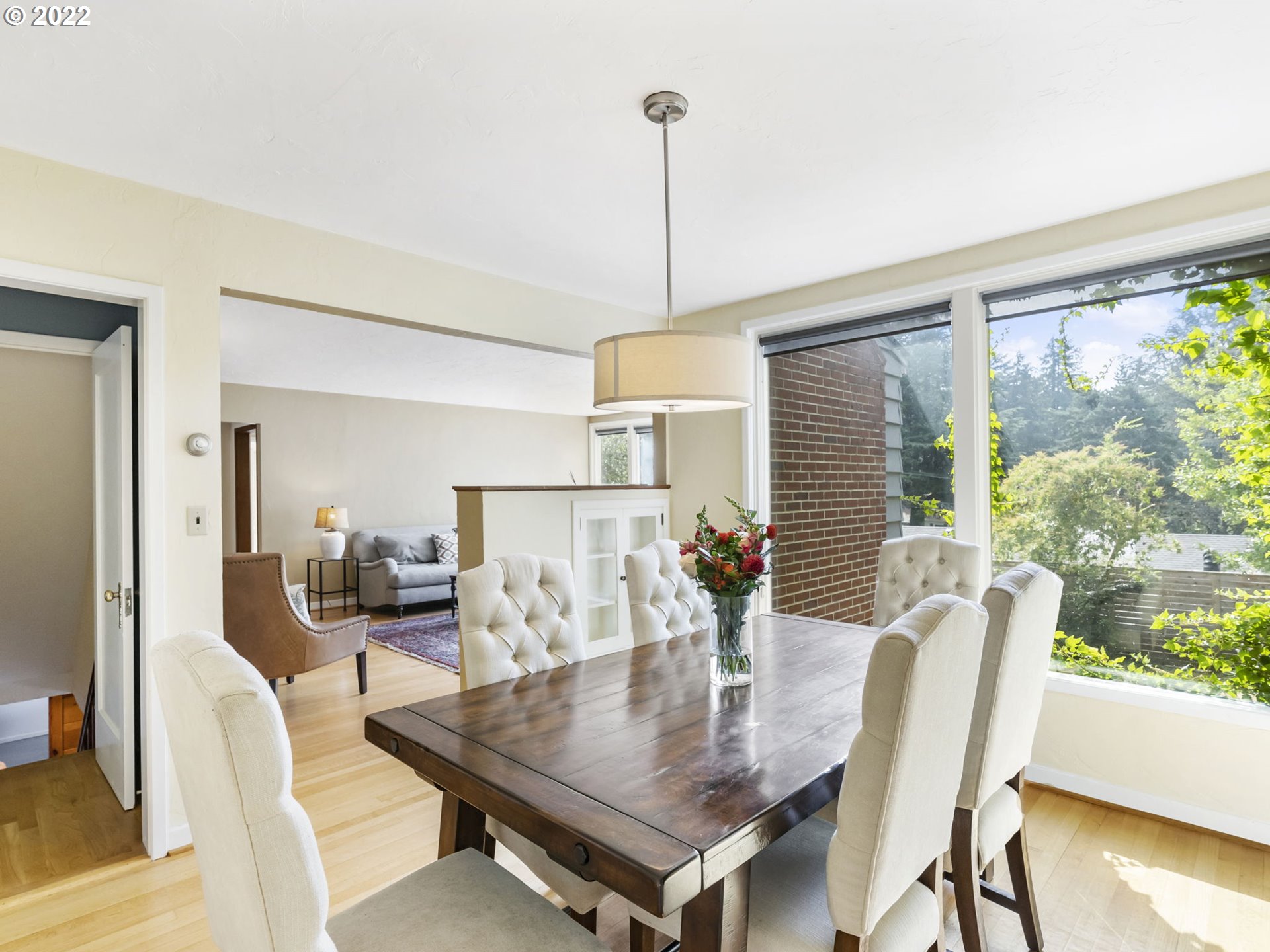 7320 Southwest Canyon Lane Portland, OR 97225 - Photo 13 of 32 a view of a dining room with furniture and wooden floor