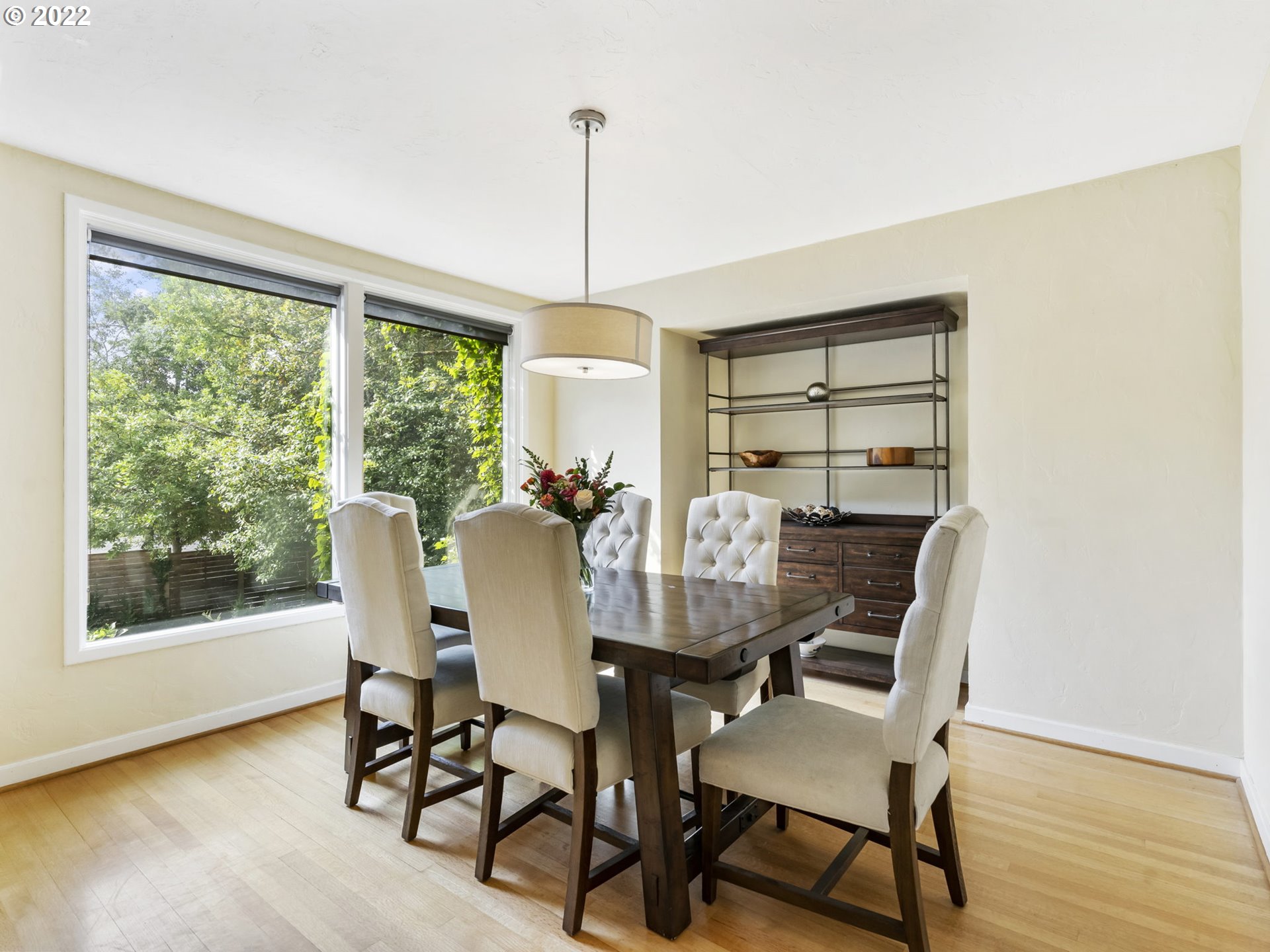 7320 Southwest Canyon Lane Portland, OR 97225 - Photo 14 of 32 a view of a dining room with furniture window and wooden floor