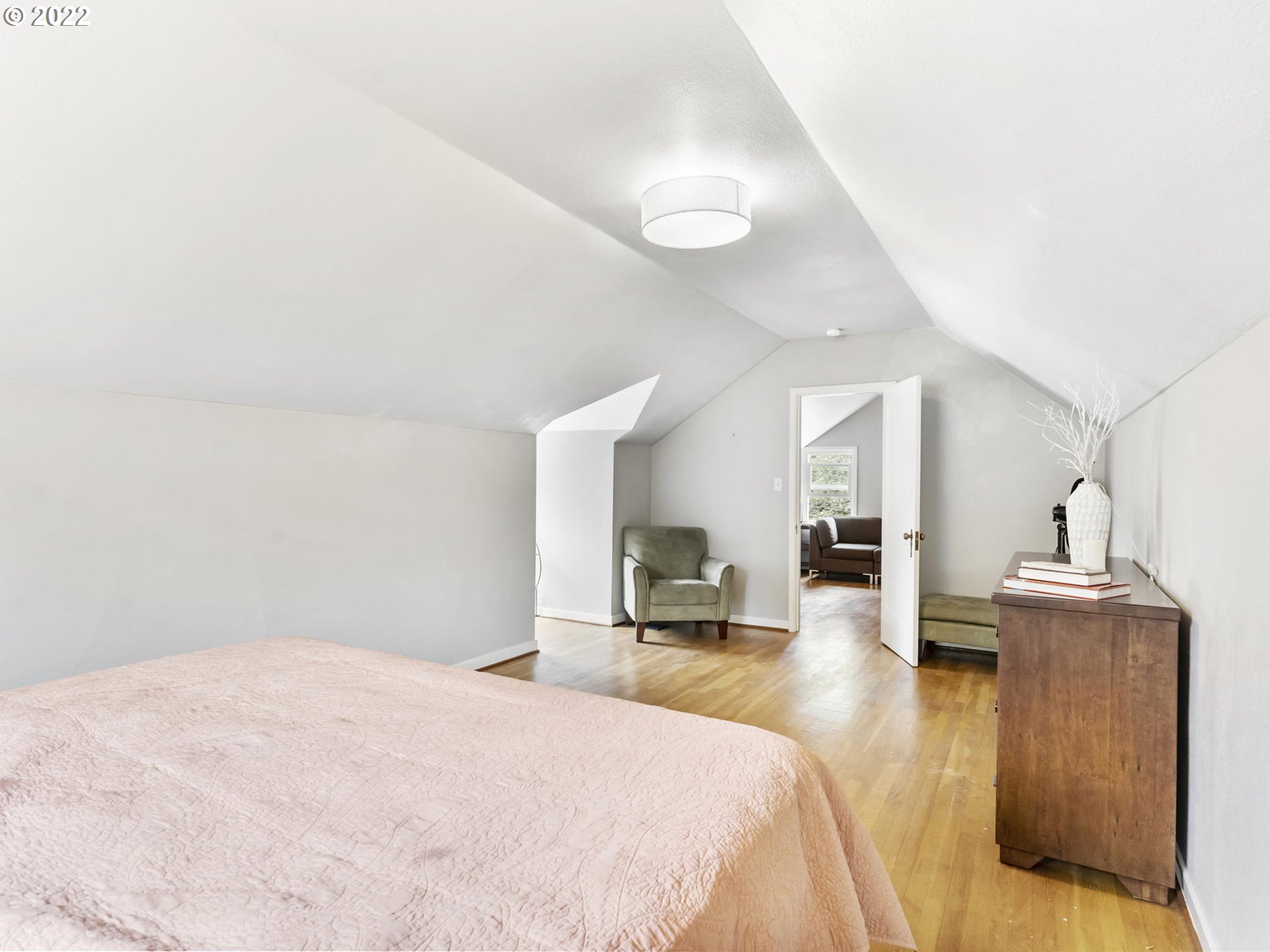 7320 Southwest Canyon Lane Portland, OR 97225 - Photo 22 of 32 a bedroom with a bed and a large window