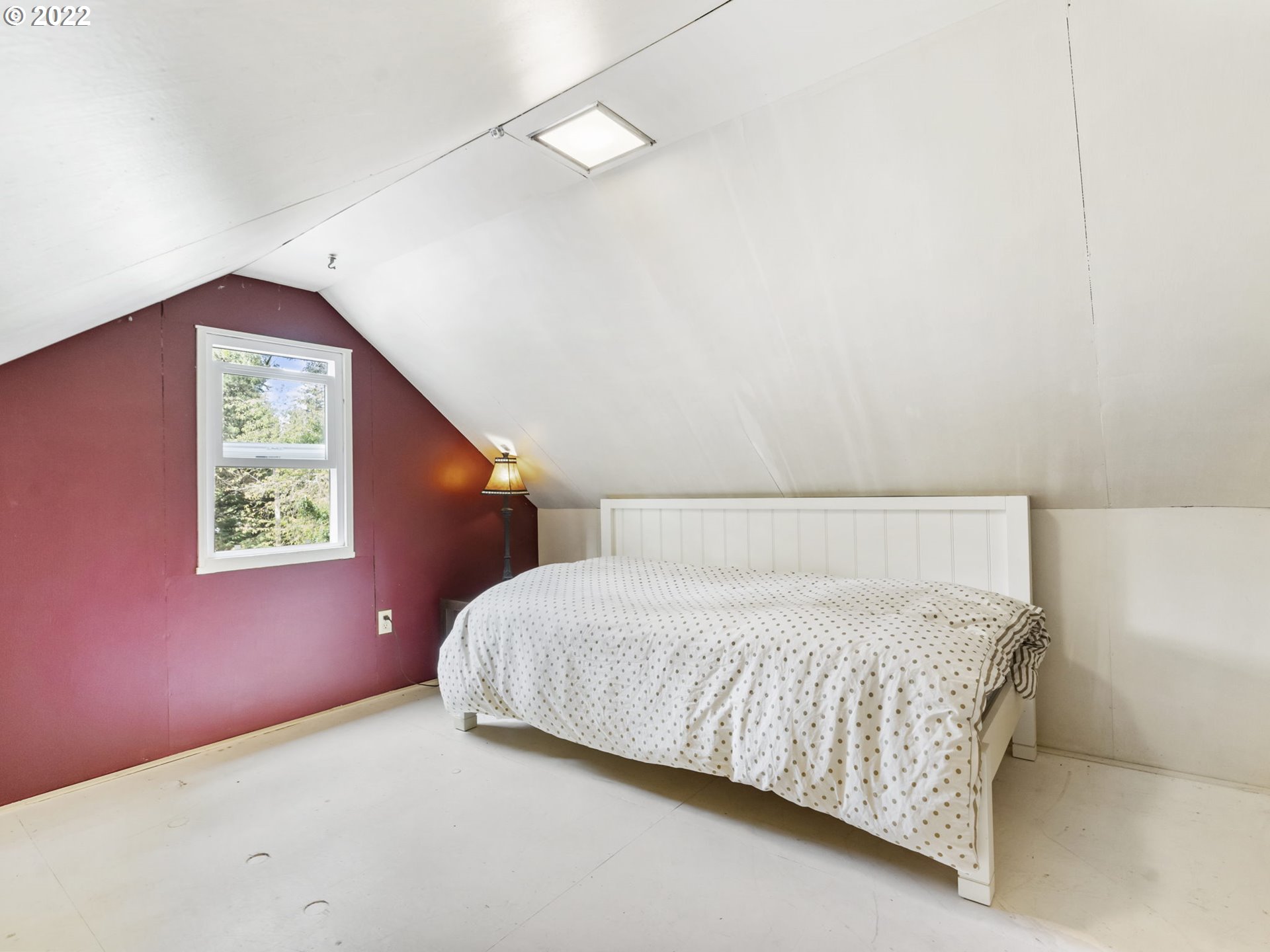 7320 Southwest Canyon Lane Portland, OR 97225 - Photo 23 of 32 a bedroom with a bed and a window