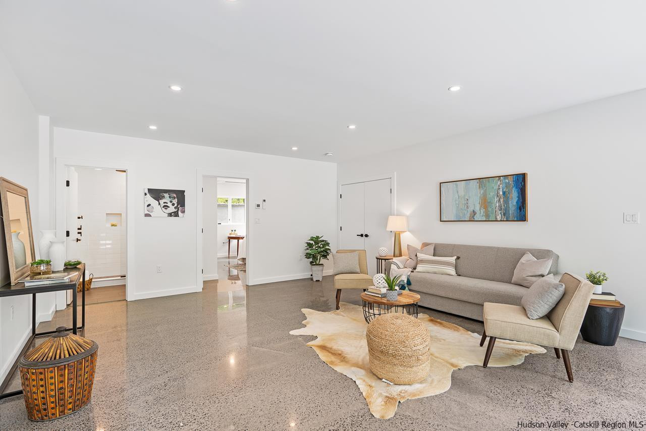 139 Krum Road Kerhonkson, NY 12446 - Photo 24 of 35 a living room with furniture and wooden floor