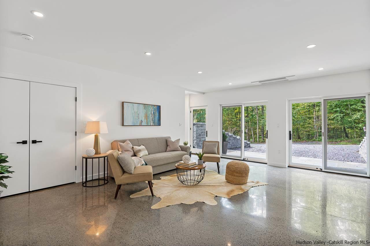 139 Krum Road Kerhonkson, NY 12446 - Photo 25 of 35 a living room with furniture and a large window