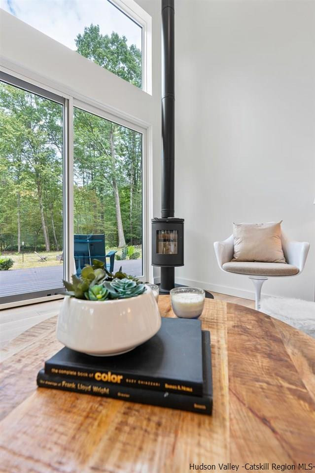 139 Krum Road Kerhonkson, NY 12446 - Photo 4 of 35 a living room with a large window and a table