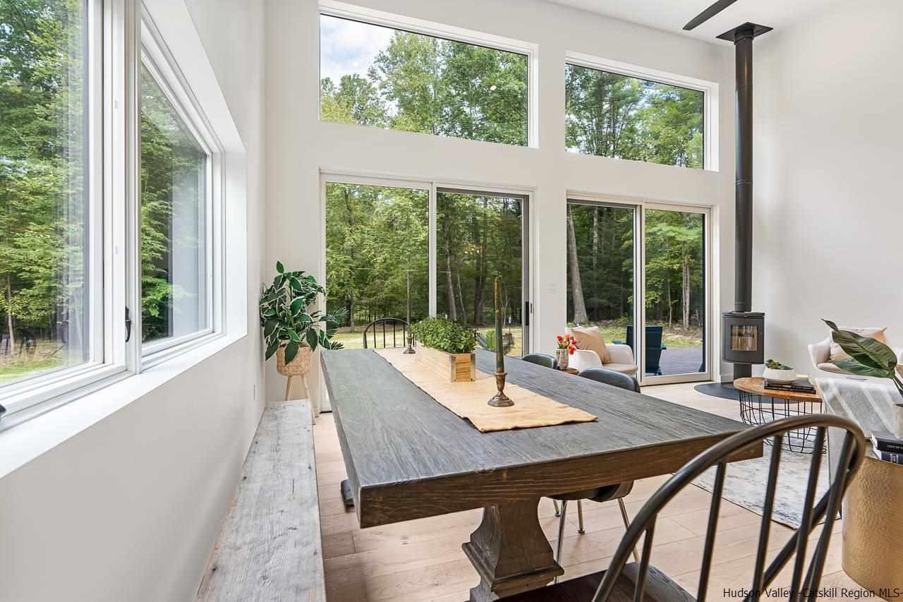 139 Krum Road Kerhonkson, NY 12446 - Photo 5 of 35 a view of a dining room with furniture window and outside view
