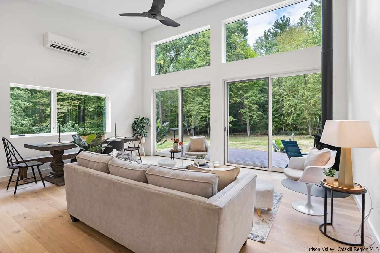139 Krum Road Kerhonkson, NY 12446 - Photo 8 of 35 a living room with furniture and a large window