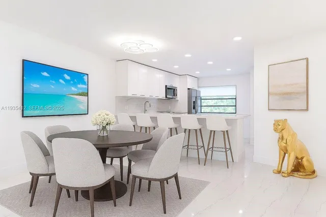 a view of a dining room with furniture