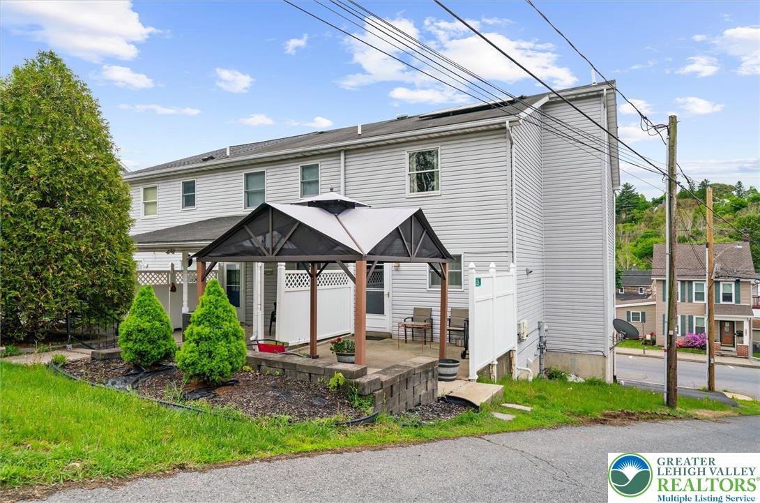 326 Chestnut Street Slatington, PA 18080 - Photo 23 of 28 a front view of a house with a yard