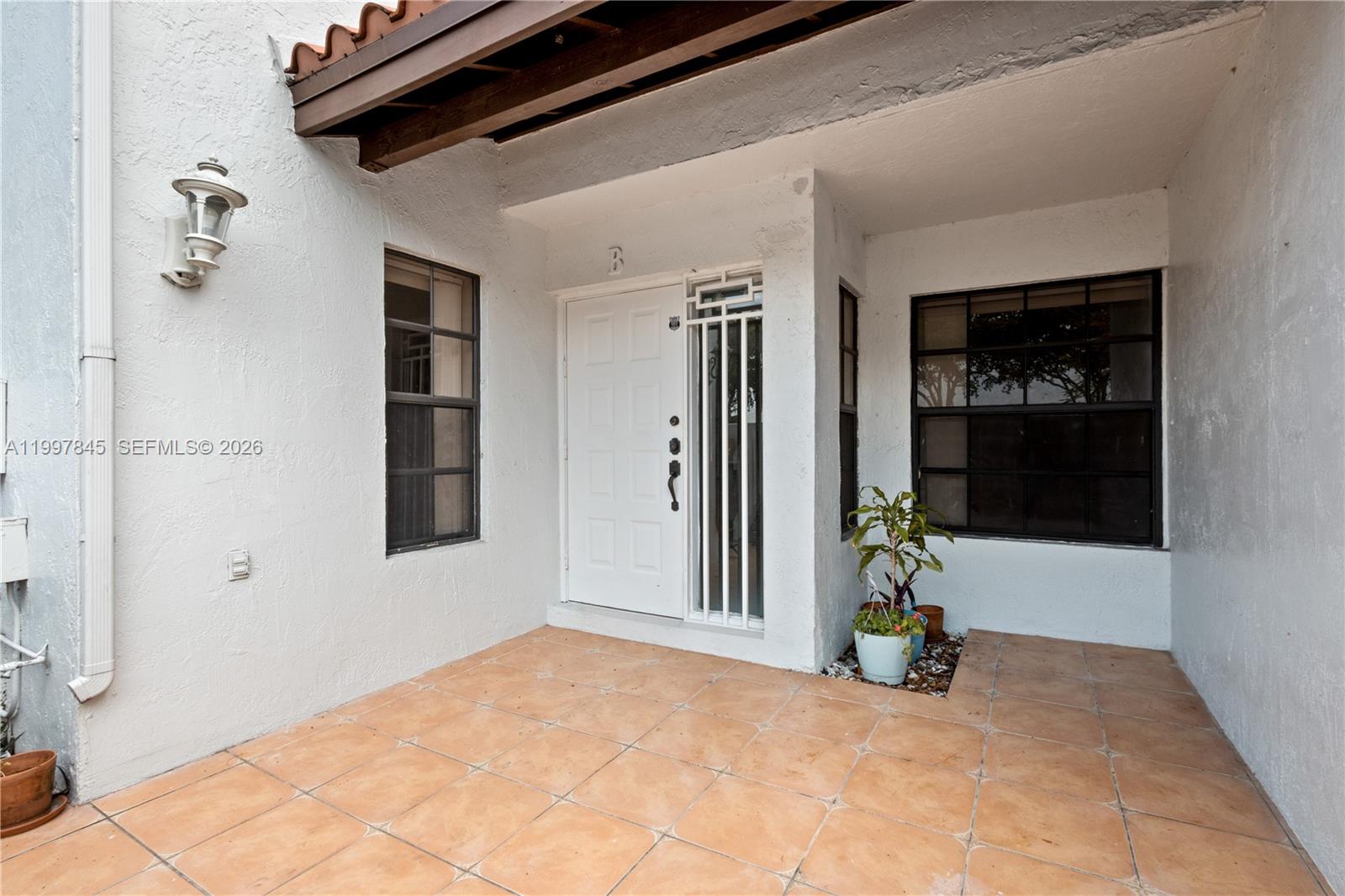 6211 Southwest 138th Court, Unit B Miami, FL 33183 - Photo 4 of 27 a view of an empty room