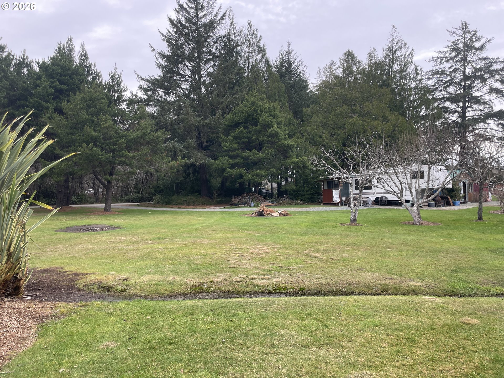 Cozy Pines Bandon, OR 97411 - Photo 11 of 13 a view of a volley ball court