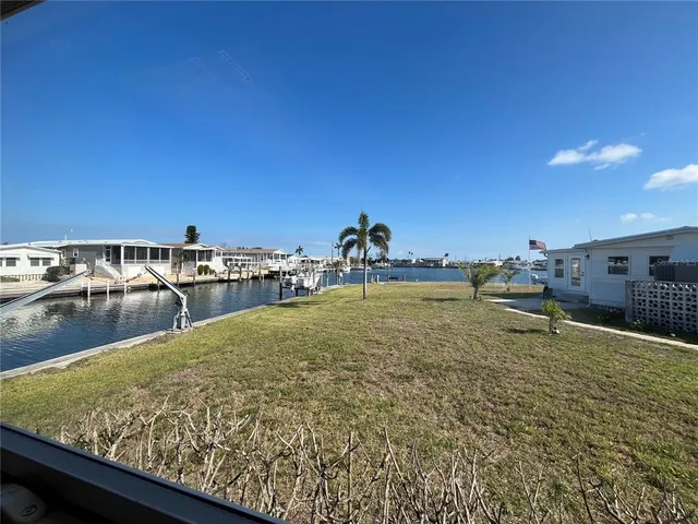 a swimming pool view with a lake view