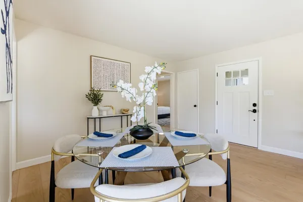 a view of a dining room with furniture